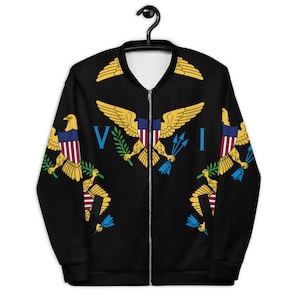 May include: A black bomber jacket with a full-colour print of the flag of the United States Virgin Islands. The flag features a golden eagle with a shield and arrows, surrounded by green leaves and the letters "VI".