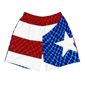 May include: White, red and blue patterned shorts with a white star on a blue background. The pattern resembles a flag.