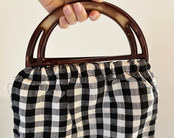 Woven shopping bag. Eco bag in black and white checkers. Canvas bag simple and elegant style