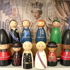 The royal family peg doll set, peg dolls, King Charles lll Coronation, queen consort, Beefeater, yeoman warders, royal guard, Prince William