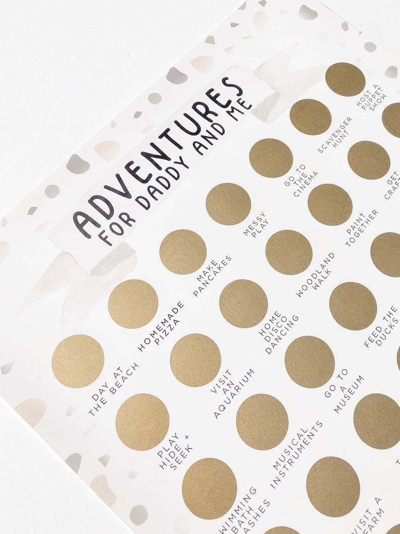 May include: A white card with gold circles containing activities for a father and child to do together. The card has the text "Adventures for Daddy and Me" at the top. Some of the activities include "Day at the Beach", "Homemade Pizza", "Make Pancakes", "Messy Play", "Go to the Cinema", "Scavenger Hunt", "Woodland Walk", "Paint Together", "Get Crafty", "Play Hide and Seek", "Visit an Aquarium", "Home Disco Dancing", "Go to a Museum", "Feed the Ducks", "Swimming Bath Ashes", "Musical Instruments", "Visit a Farm", and "Host a Puppet Show".
