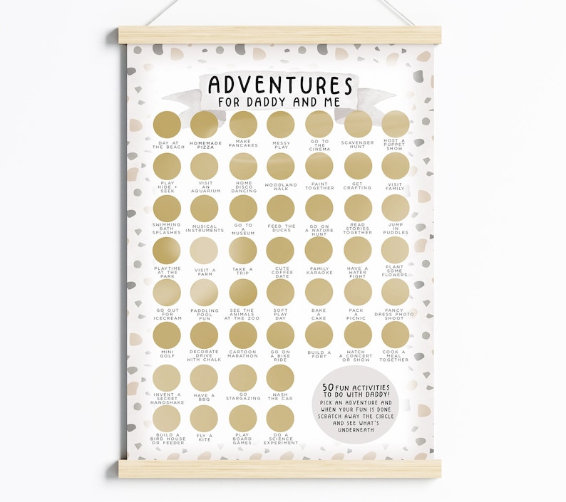 May include: A printable poster with a white background and a gray and beige terrazzo pattern. The poster features 50 fun activities to do with a dad, such as going to the beach, visiting an aquarium, and baking a cake. The poster has a gold circle around each activity and the text "50 Fun Activities to do with Daddy!" is at the bottom.