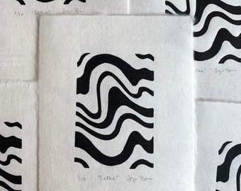 May include: Black and white abstract print with wavy lines. The print is numbered 1/10 and titled "Lethe" with the artist's signature.