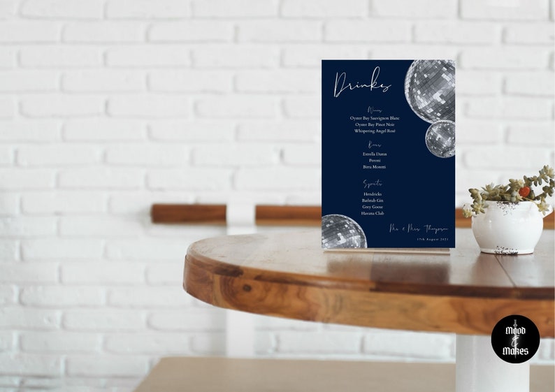 May include: A blue and white drinks menu with a disco ball design. The menu lists various drinks, including beer, wine, and spirits. The text at the bottom reads "The & Mrs. Thompson 7th August 2021."
