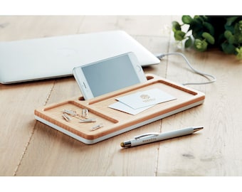 Wireless charger storage box with bamboo top, USB hub and smartphone stand/holder.