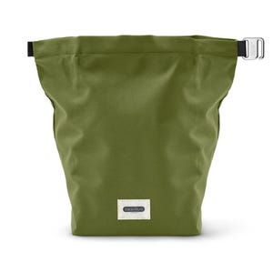 May include: A green canvas drawstring bag with a black strap and a small white label that says "Black+Blum".