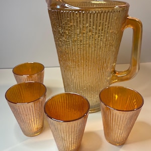 Jeanette Carnival Glass Pitcher with Matching Glasses