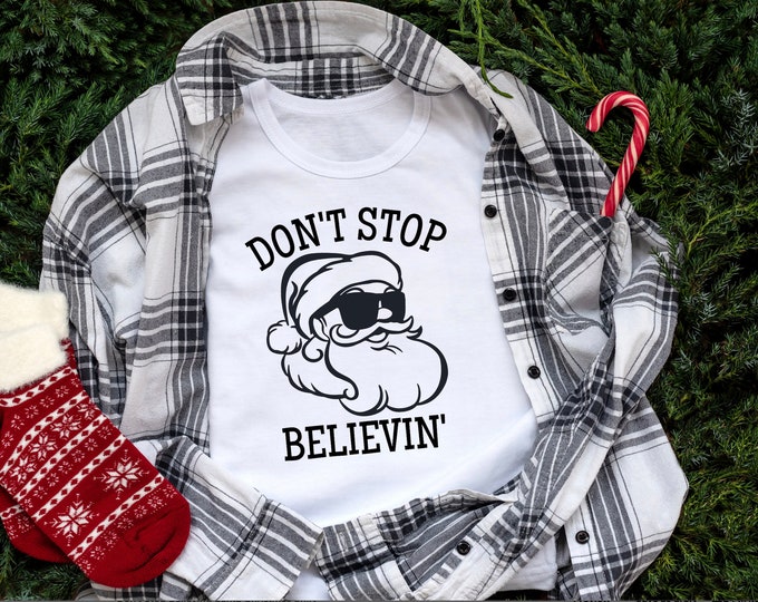 Don't Stop Believing Santa Christmas Shirt