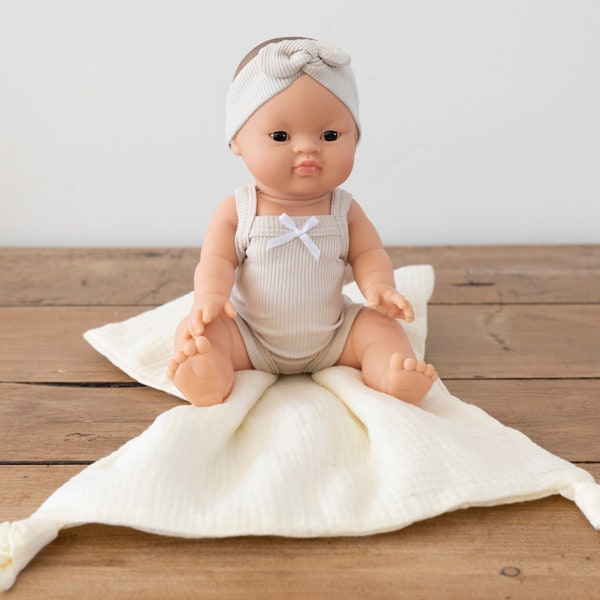 Wren | Baby Girl with Brown Hair Brown eyes and Ivory Romper and Headband