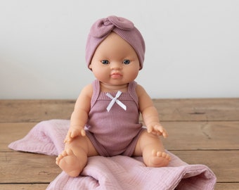 Lilly | Baby Girl with Brown Hair Blue eyes and Dusty Pink Romper and Headband