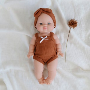 Lilly Baby Girl with Brown Hair Blue eyes and Cognac Romper and Headband image 5