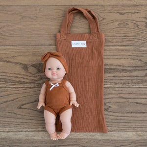 Lilly Baby Girl with Brown Hair Blue eyes and Cognac Romper and Headband image 4