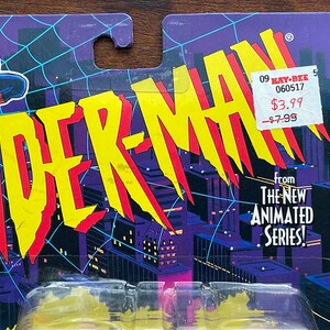 May include: A vintage action figure card featuring Spider-Man from the animated series. The card is yellow, red, and blue with a cityscape background. The price tag reads "$3.99" and "-$7.99".