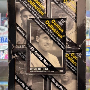 May include: A pack of 1942 Conlon Collection baseball cards featuring Ossie Bluege of the Washington Senators. The cards are from The Sporting News and include 18 cards per pack.