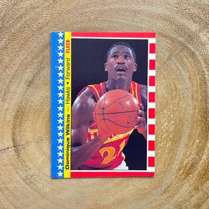 1987 Fleer Basketball Sticker, Dominique Wilkins # 7 of 11