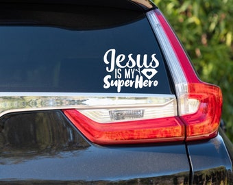 May include: White vinyl decal with the text "Jesus is my Superhero" with a heart and a superhero symbol.