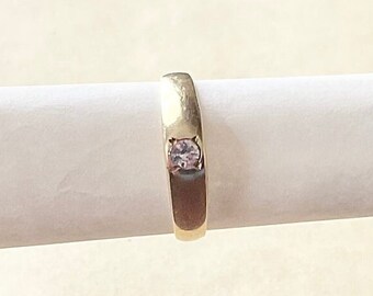 Vintage 14 Karat Gold Pinkie Ring With A Clear Stone. Ring is a size 51/2 And Weighs About 2 Grams. Marked 14K.