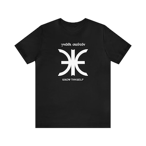 May include: Black t-shirt with a white graphic design featuring a symbol and the text "Know Thyself" in English and Greek.