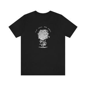 May include: Black t-shirt with a white graphic of a rose with the text "DAT ROSA MEL APIBUS" around it.