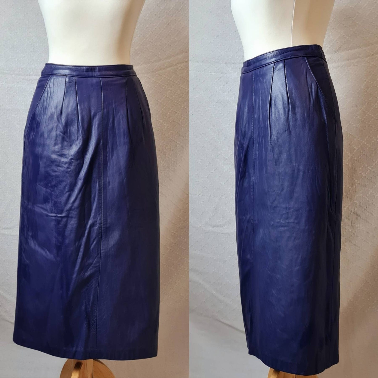 The most incredible 1980s midi skirt made from a deep purple leather... Has a tight pencil silhouette, pockets and kick split. It's very Mugler! A little bit gothic, a little bit dominatrix, it's just a fabulous skirt!