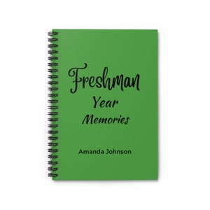 May include: Green spiral bound notebook with the text "Freshman Year Memories" and the name "Amanda Johnson" printed in black.