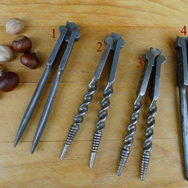 Choice of 4 Antique german steel nutcrackers, start to mid 1900s, for small and large nuts 360degrees swivel, cast steel nutcrackers