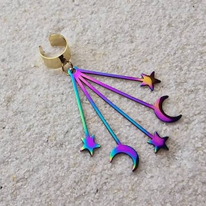 COMET EAR CUFF made of metal with huge astro pendant made of stainless steel