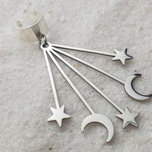 COMET EAR CUFF made of metal with huge astro pendant made of stainless steel