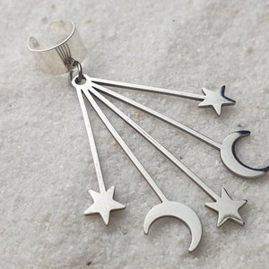 COMET EAR CUFF made of metal with a huge astro jewelry pendant made of stainless steel