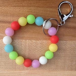 Regenboog siliconen kralen sleutelhanger schoudertasje, kaarthouder cruise, glow in the dark armband, sleutelhanger voor kinderen, school-ID-houder