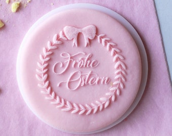 Frohe ostern in a wreath embosser, cookie biscuit stamp, cake decorating, fondant icing.