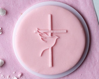 Cross with a dove embosser, cookie biscuit stamp, cake decorating, fondant icing.