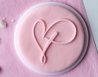 Cross in the heart embosser, cookie biscuit stamp, cake decorating, fondant icing.