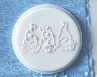 Three christmas dwarts embosser, cookie biscuit stamp, cake decorating, fondant icing.