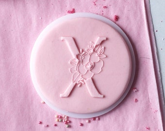 Floral X Letter embosser, cookie biscuit stamp, cake decorating, fondant icing.