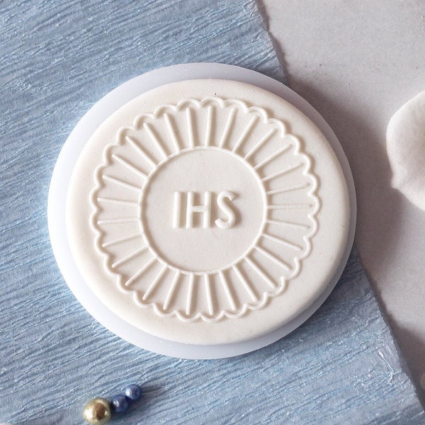 Ihs in the shape of sun, embosser, cookie biscuit stamp, cake decorating, fondant icing.