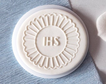 Ihs in the shape of sun, embosser, cookie biscuit stamp, cake decorating, fondant icing.