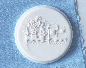 Puffing billy embosser, cookie biscuit stamp, cake decorating, fondant icing.