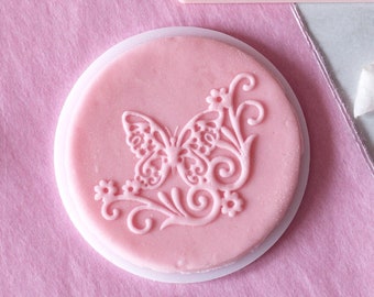 Butterfly in ornaments embosser, cookie biscuit stamp, cake decorating, fondant icing.