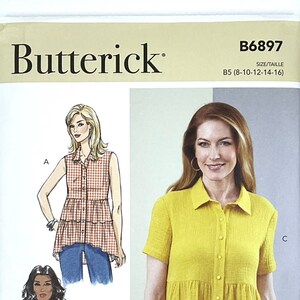 May include: A sewing pattern for a tiered blouse with a button-up front. The pattern includes three different views: a sleeveless blouse, a long-sleeved blouse, and a short-sleeved blouse. The pattern is for sizes 8-10-12-14-16. The pattern is from Butterick and the pattern number is B6897.