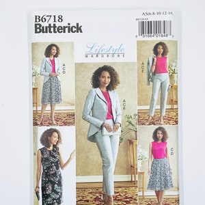 May include: A Butterick sewing pattern, B6718, featuring a Lifestyle Wardrobe. The pattern includes options for a blazer, pants, skirt, and dress. The cover showcases various outfit combinations in shades of gray, pink, and black, with the text "Designed and printed in USA."