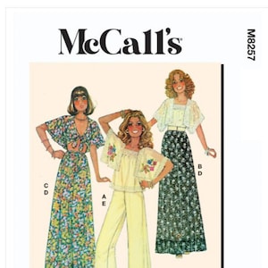 May include: Vintage McCall's sewing pattern M8257 for a 70's style outfit. The pattern includes three different looks: a long floral skirt with a matching top, a pair of wide-legged trousers with a lace top, and a long floral skirt with a lace top.