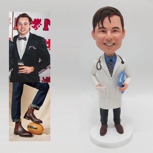 Personalized custom bobbleheads, cake toppers, unique gifts, wedding cake toppers, doctor bobbleheads, birthday bobbleheads