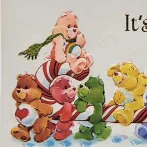 May include: A vibrant illustration of Care Bears in various colours, including brown, pink, green, and yellow. One bear wears a green scarf and holds a rainbow. The bears are arranged on a candy cane, creating a cheerful scene.