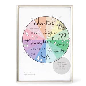 May include: Silver-plated photo frame with a white background featuring a colourful wheel design with words like "adventure," "love," and "family." The frame is 12.5cm x 17.5cm and has a simple, elegant design.