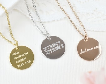 May include: Three personalized disc necklaces in gold, silver, and rose gold. The gold necklace has the name "Aiden", date, time, and weight. The silver necklace has coordinates. The rose gold necklace says "best mom ever".