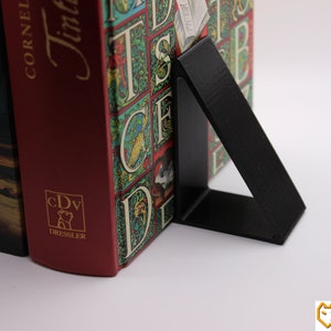Bookend book end triangular book end
