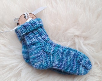 Hand Knit Wee Beastie Baby Socks in the shade 'Aurora Borealis'