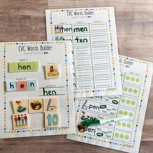 May include: Three printable worksheets for teaching children about the "en" word family. The worksheets include activities such as reading, building, matching, tracing, and writing words like "hen", "ten", "pen", "zen", and "den".
