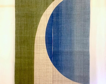 May include: A green, beige, and blue fabric room divider with a curved design. The divider is made of a woven fabric and has a subtle texture.